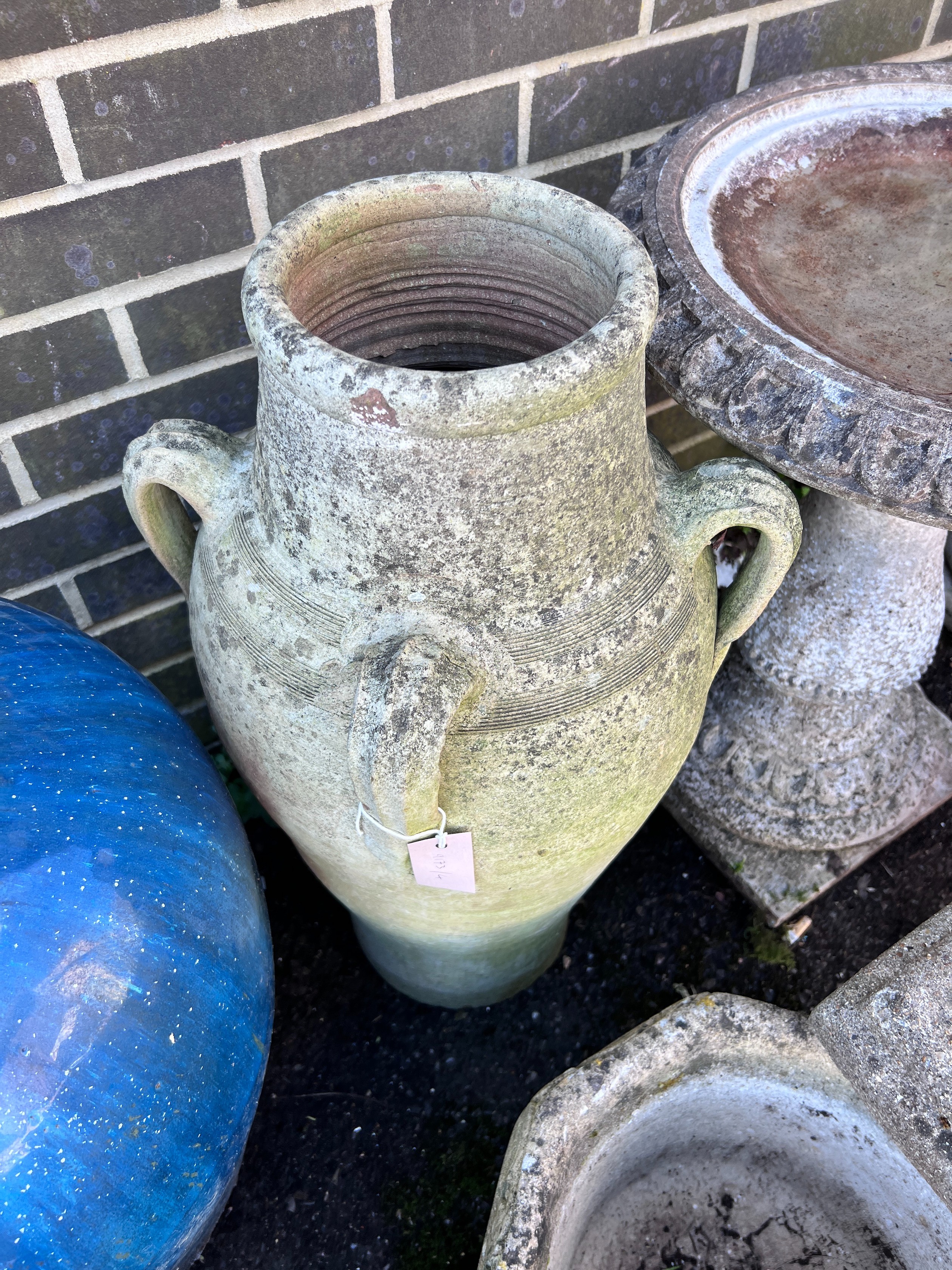 A Greek style earthenware garden urn, height 70cm *Please note the sale commences at 9am.